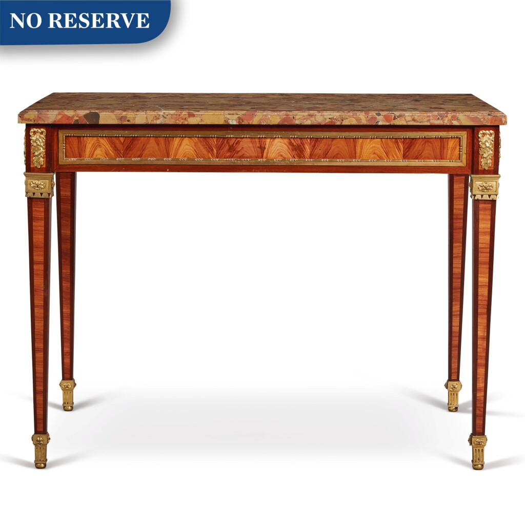 View full screen - View 1 of Lot 318. A Louis XVI Style Gilt Bronze-Mounted Tulipwood Center Table with a Breche d'Alep Marble Top, Late 19th Century.