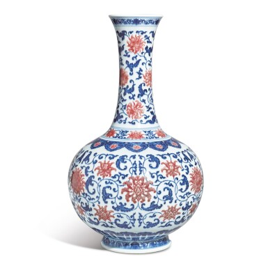 View full screen - View 1 of Lot 544. A FINE AND EXCEPTIONALLY RARE UNDERGLAZE-BLUE AND COPPER-RED 'LOTUS' BOTTLE VASE, QIANLONG SEAL MARK AND PERIOD.