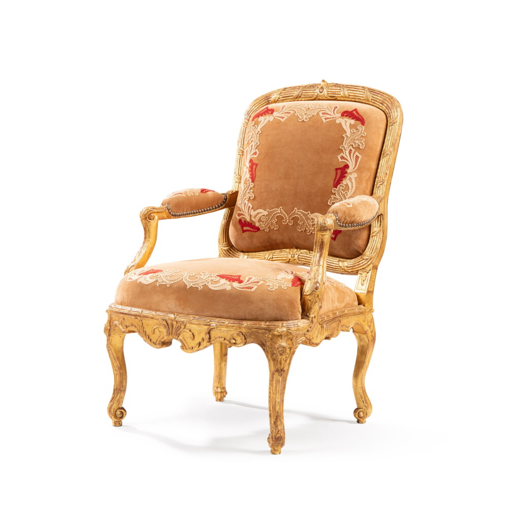 View full screen - View 1 of Lot 510. A Louis XV carved giltwood fauteuil à chassis, circa 1730.