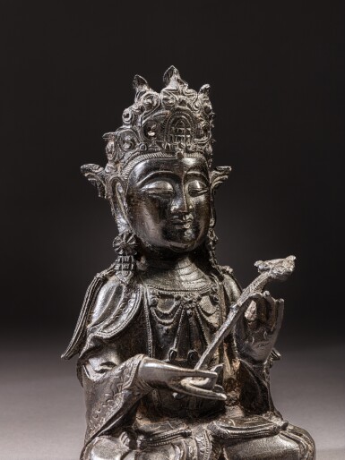 View full screen - View 1 of Lot 347. A bronze figure of a seated bodhisattva, Ming dynasty, 17th century.