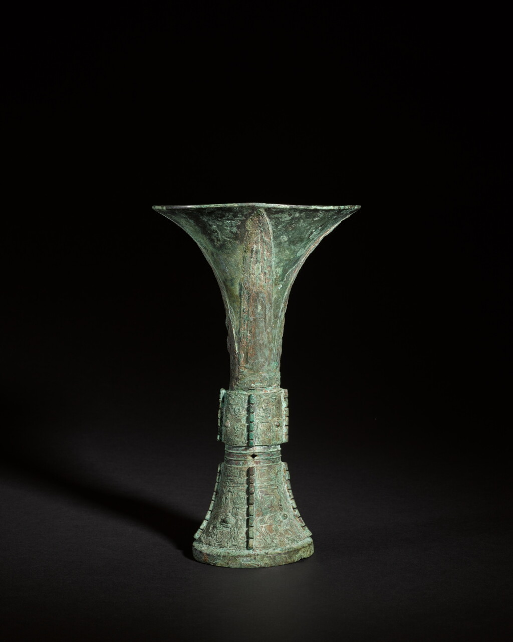 View full screen - View 1 of Lot 107. The Xizisun Gu, An archaic bronze ritual wine vessel (Gu), Shang dynasty.
