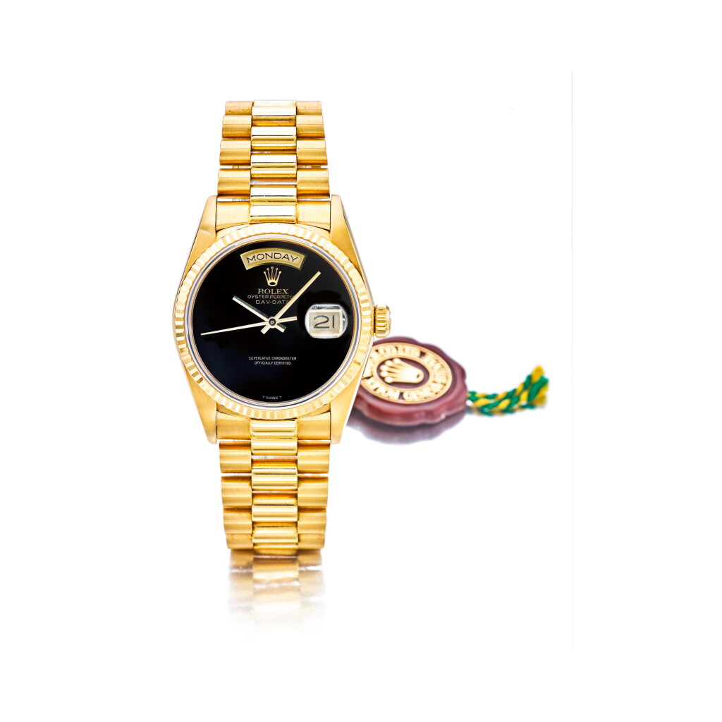 View full screen - View 1 of Lot 815. ROLEX | REF 18038 DAY DATE, A YELLOW GOLD AUTOMATIC CENTER SECONDS WRISTWATCH WITH DAY DATE AND BRACELET, CIRCA 1985 | 勞力士 | 18038型號「DAY DATE」黃金自動上鏈鍊帶腕錶備星期及日期顯示,年份約1985.