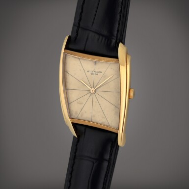 View full screen - View 1 of Lot 73. Reference 3424 | A yellow gold asymmetrical wristwatch designed by Gilbert Albert | Made in 1961 | 百達翡麗 | 型號3424 |黃金不對稱腕錶,Gilbert Albert 設計,製作年份1961.