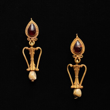 View full screen - View 1 of Lot 607. A Pair of Hellenistic Gold, Garnet, and Shell Earrings, circa 1st Century B.C..