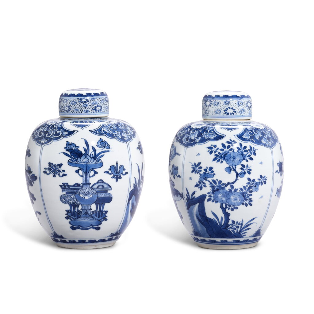 View full screen - View 1 of Lot 9332. A pair of blue and white ‘hundred antiques’ ginger jars and covers, Qing dynasty, Kangxi period | 清康熙 青花博古花卉圖連蓋罐一對.
