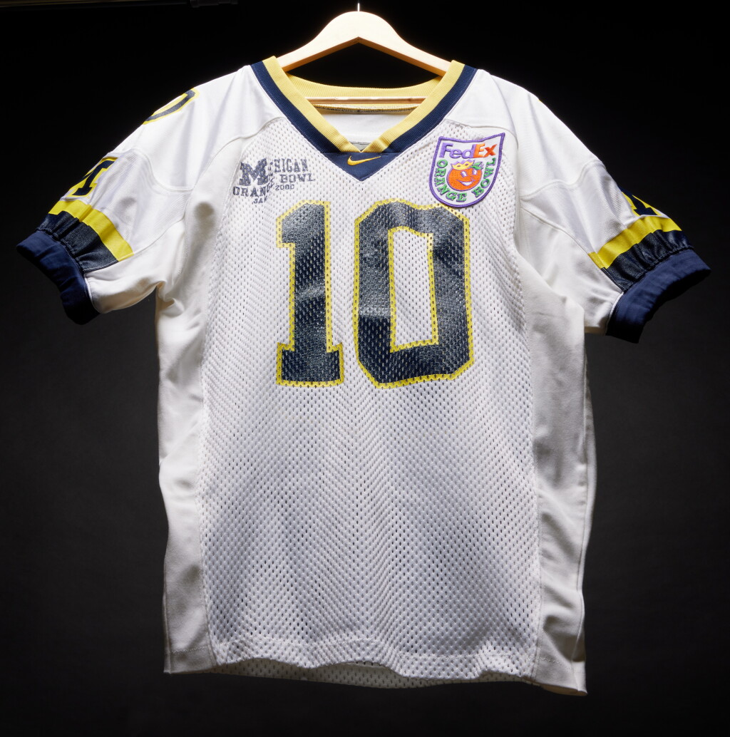 View full screen - View 1 of Lot 10. Tom Brady University of Michigan ‘Final College Game’ Worn Jersey | 2000 FedEx Orange Bowl | Matched to 2 Games.
