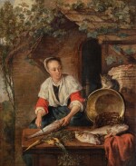 A maid cleaning fish outside a house