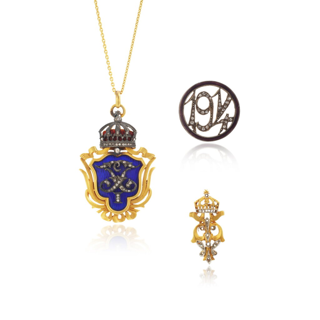 View full screen - View 1 of Lot 1052. Enamel and diamond presentation pendant and two brooches, early 20th century.