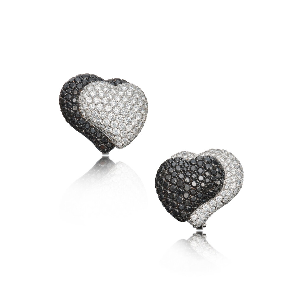 View full screen - View 1 of Lot 154. A Pair of Colored Diamond and Diamond Earclips.