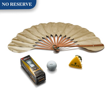 View full screen - View 1 of Lot 8076. ROLEX | A SET OF PROMOTIONAL GOLFING MEMORABILIA, INCLUDING A FAN, THREE GOLF BALLS AND NAVIGATION MARK, CIRCA 1980 AND 2015.