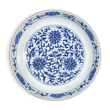 View full screen - View 1 of Lot 620. A blue and white 'lotus' dish, Mark and period of Tongzhi | 清同治 青花纏枝蓮紋盤 《大清同治年製》款.
