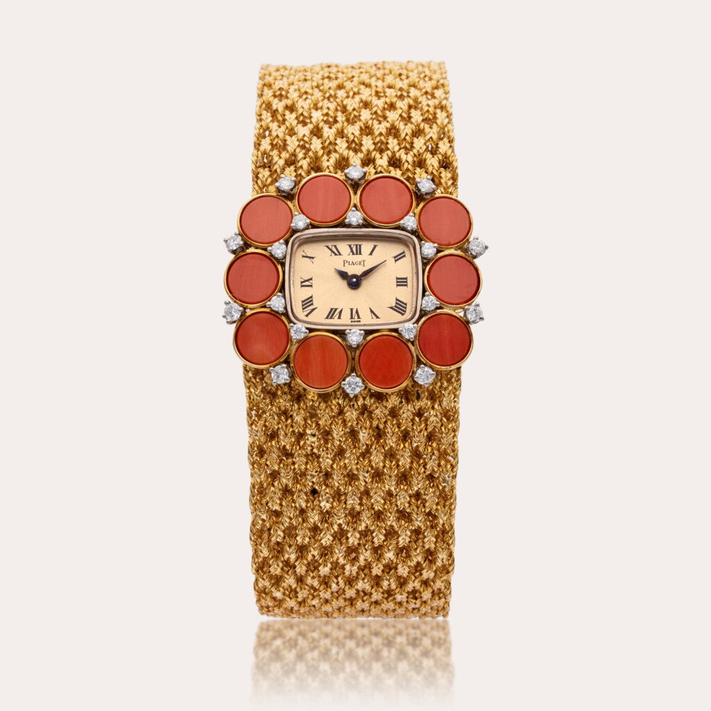 View full screen - View 1 of Lot 463. Reference 3656 N 38 | A yellow gold, diamond, and coral-set bracelet watch, Circa 1970.