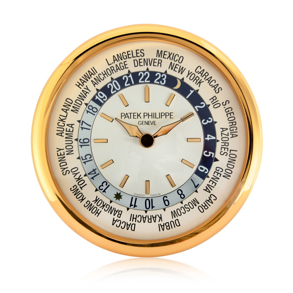 View full screen - View 1 of Lot 87. A large brass wall clock with world time dial, Circa 2000.