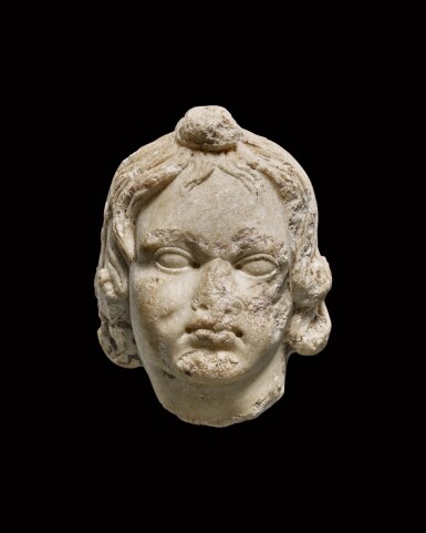 View full screen - View 1 of Lot 170. A Roman Marble Head of a Boy or Eros, circa 1st/2nd Century A.D..