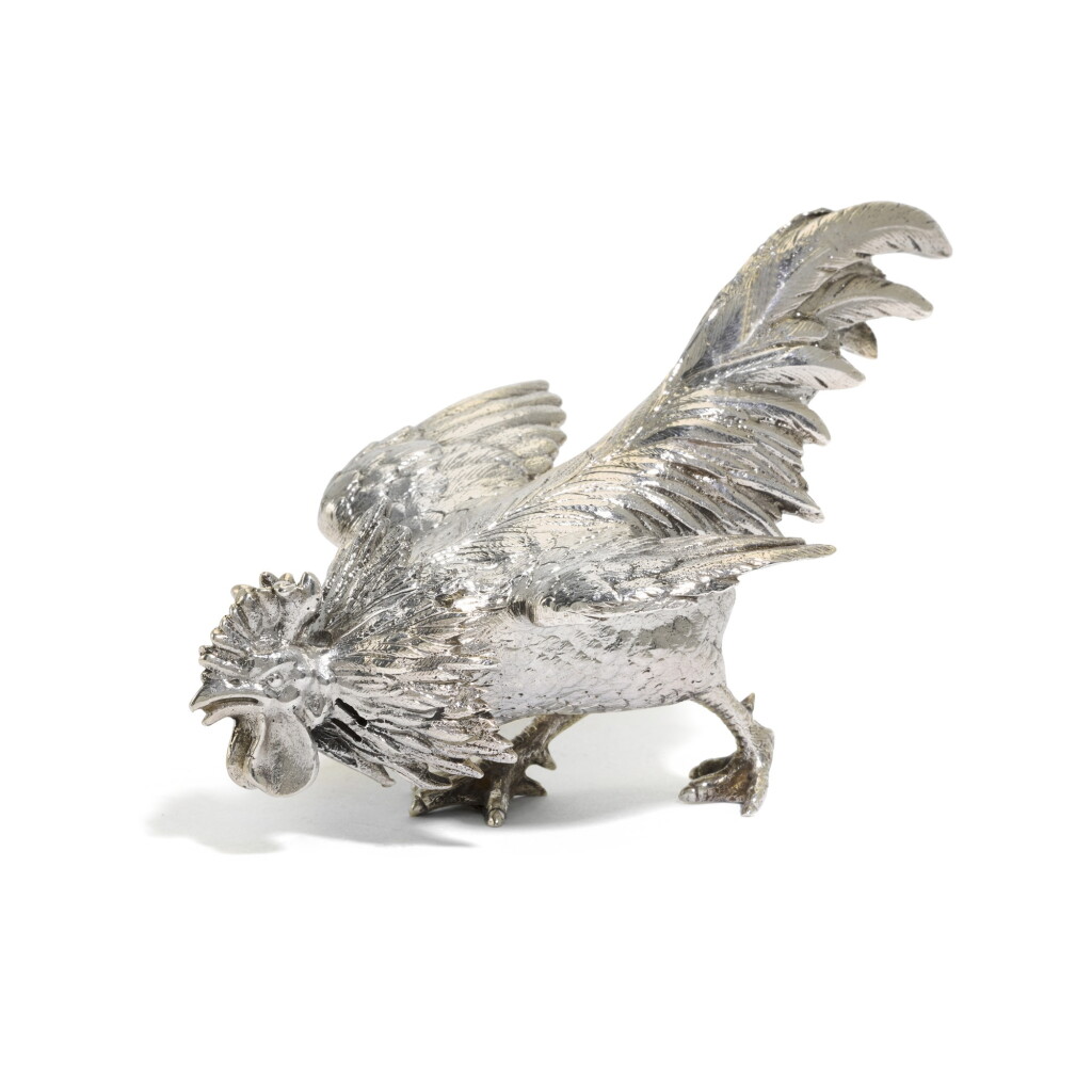 View full screen - View 1 of Lot 24. An unusual Victorian silver salt and pepper shaker in the form of a fighting cock, E. H. Stockwell, London, 1883.