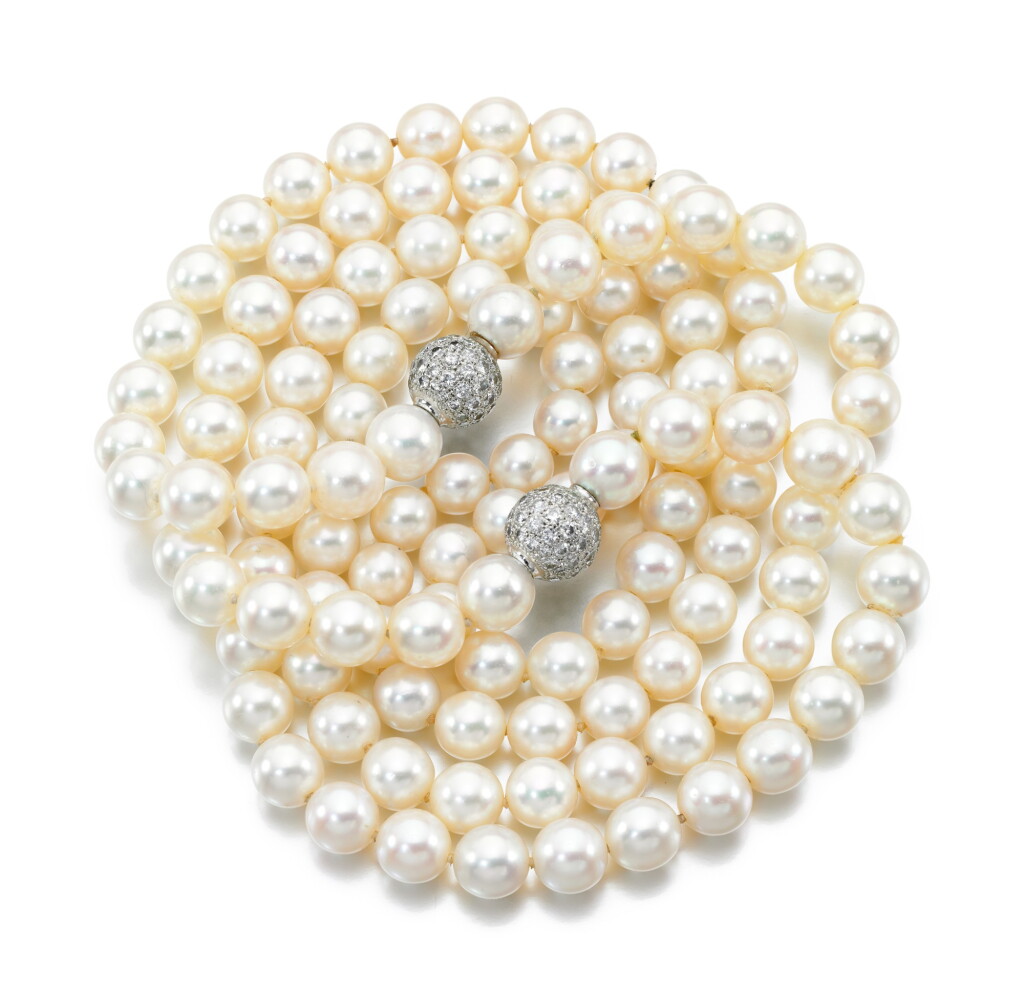 View full screen - View 1 of Lot 105. TWO CULTURED PEARL AND DIAMOND NECKLACES.