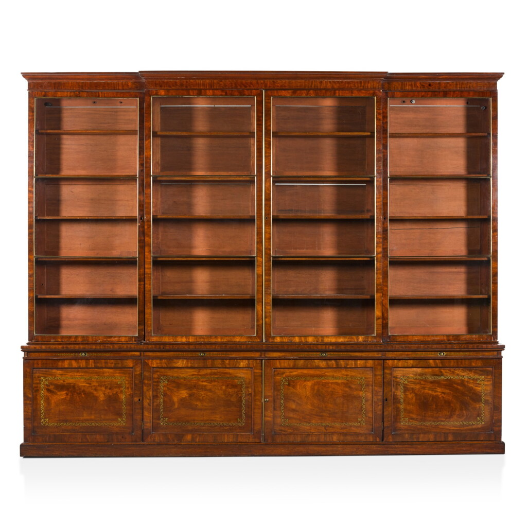 View full screen - View 1 of Lot 79. A George IV brass-inlaid mahogany bookcase, early 19th century.