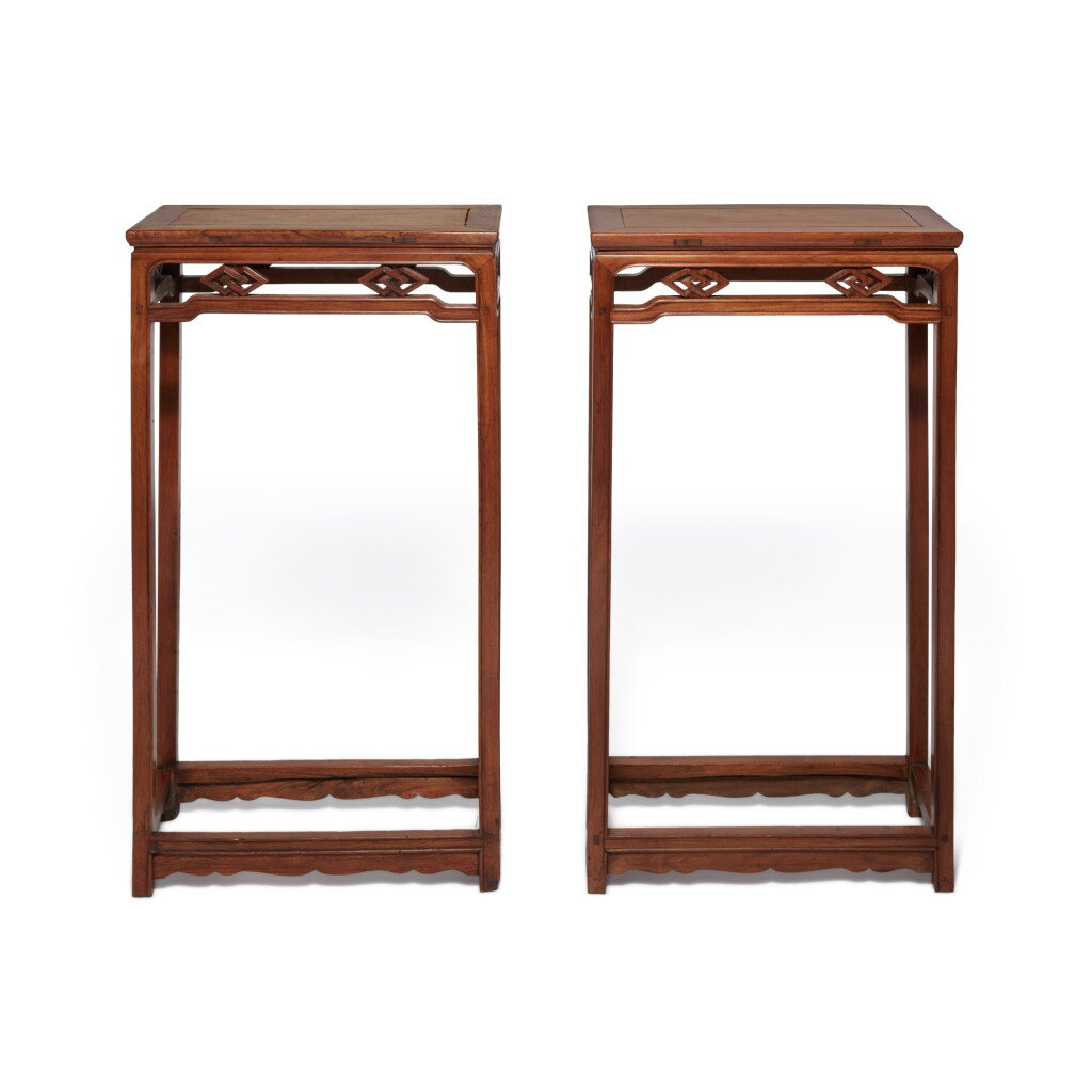 View full screen - View 1 of Lot 568. A pair of 'huanghuali' and 'huali' stands (Xiangji), Qing dynasty, 19th century | 清十九世紀 黃花梨拼花梨木有束腰方勝卡子花香几一對.