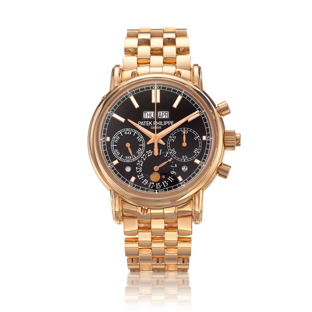 View full screen - View 1 of Lot 110. Reference 5204/1R, Retailed by Tiffany & Co.: A pink gold perpetual calendar, split-seconds chronograph wristwatch with moon phases, day/night indication, and bracelet, Circa 2017 百達翡麗 粉紅金萬年曆追針計時鍊帶腕錶備月相及晝夜顯示,約2017年製,零售商為蒂芙尼.