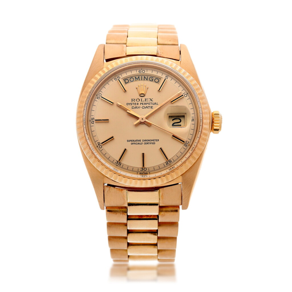 View full screen - View 1 of Lot 120. REFERENCE 1803 DAY-DATE A PINK GOLD AUTOMATIC WRISTWATCH WITH DAY, DATE AND BRACELET, CIRCA 1972.