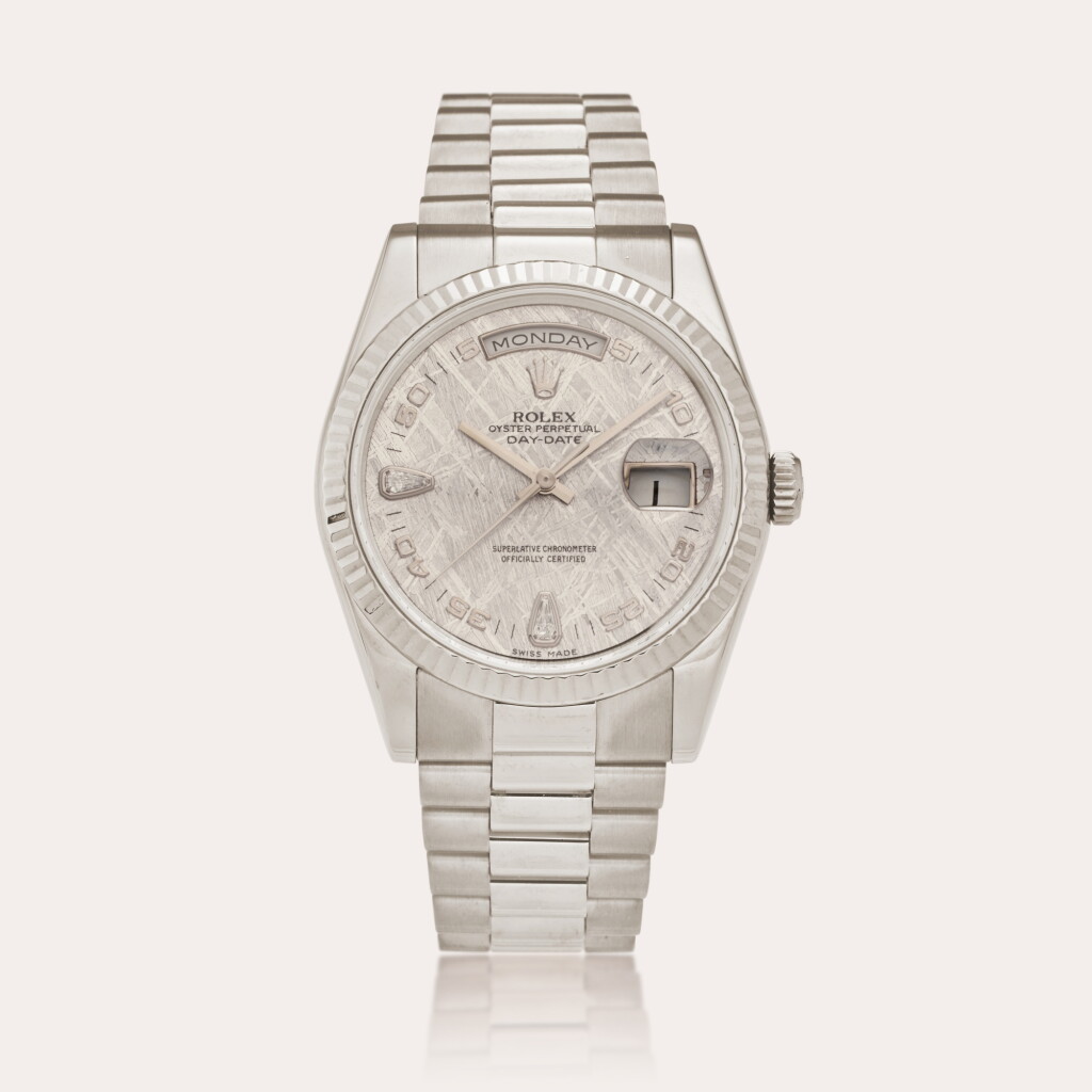View full screen - View 1 of Lot 165. Reference 118239 Day-Date | A white gold and diamond-set automatic wristwatch with day, date, bracelet, and meteorite dial, Circa 2000.