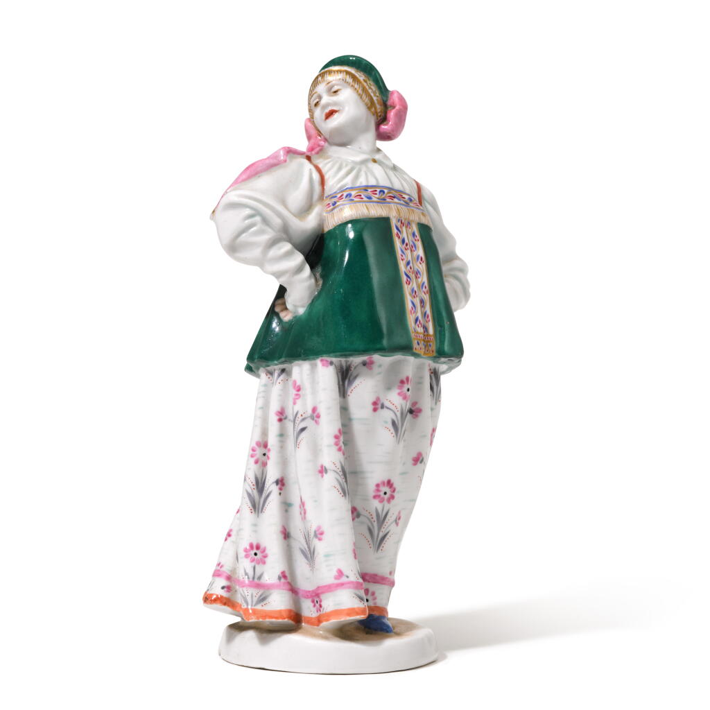 View full screen - View 1 of Lot 242. Saratov women: a Soviet porcelain figure from the ‘Peoples of Russia’ series, State Porcelain Factory, Petrograd, circa 1920-30.