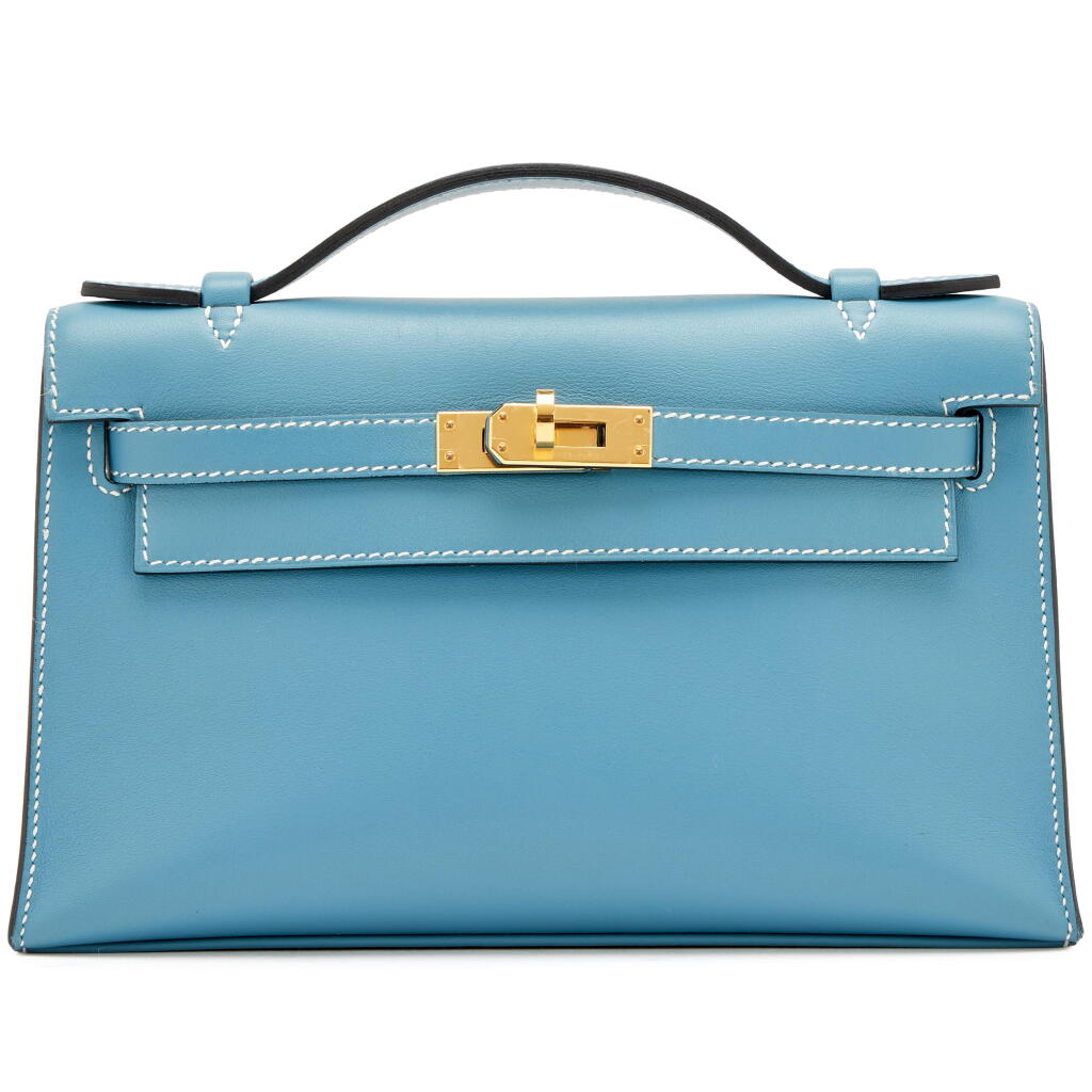 View full screen - View 1 of Lot 52. New Bleu Jean Swift Kelly Pochette Gold Hardware, 2023.