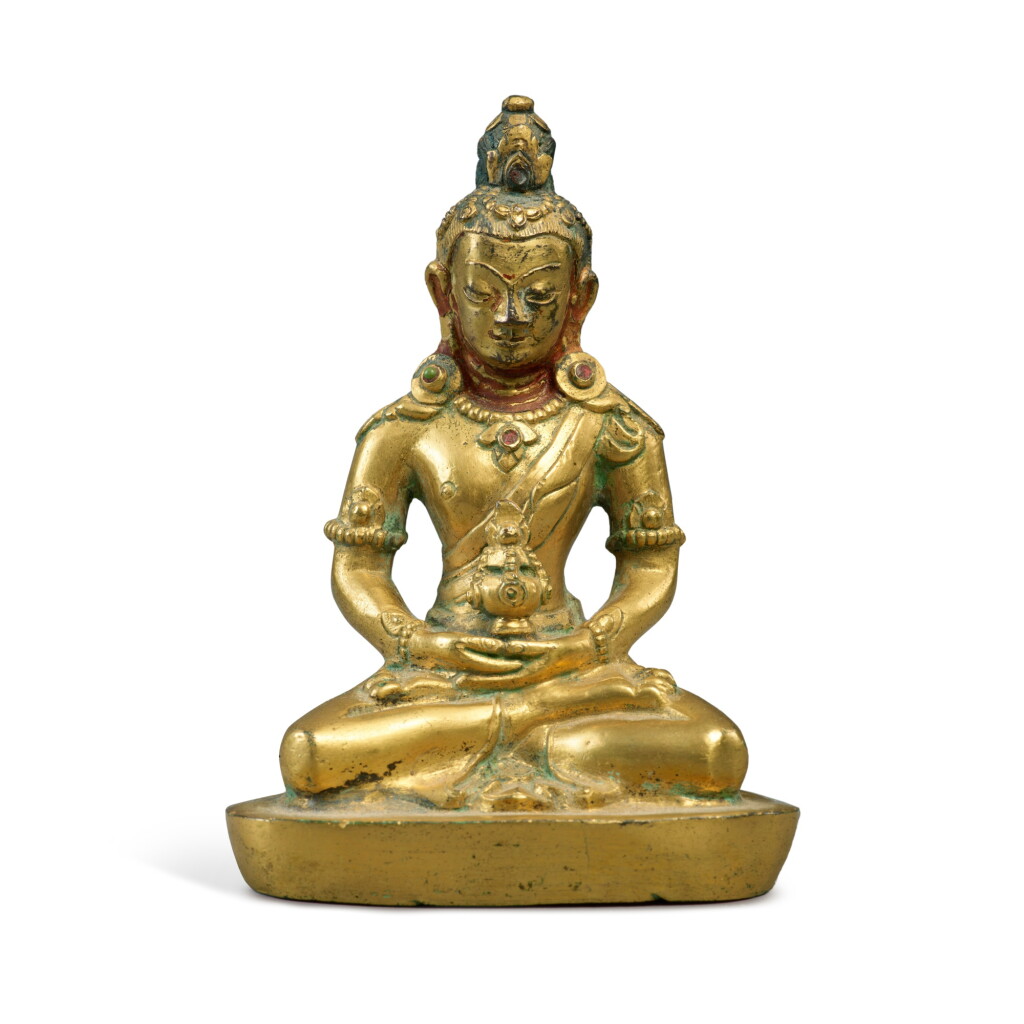 View full screen - View 1 of Lot 200. A gilt-bronze figure of Amitayus, Qing dynasty, 18th century.