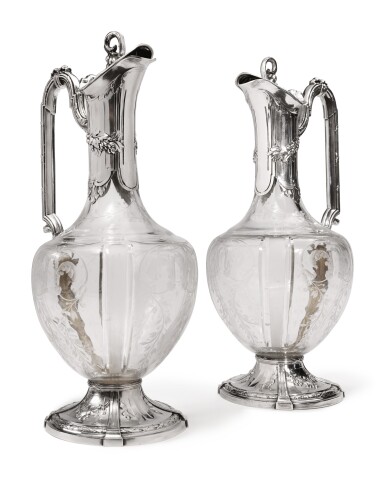 View full screen - View 1 of Lot 330. A PAIR OF FRENCH SILVER-MOUNTED CUT-GLASS CLARET JUGS, LOUIS COIGNET, PARIS, CIRCA 1890.