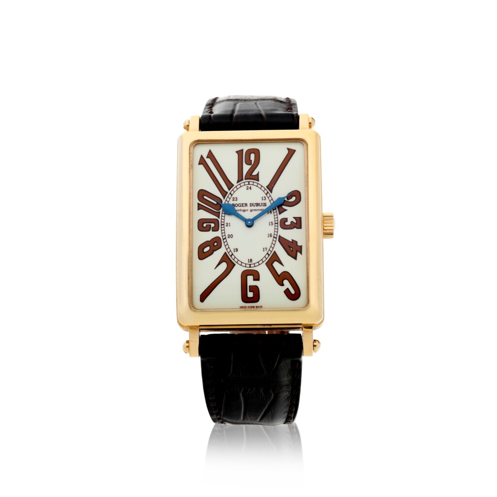 View full screen - View 1 of Lot 273. MUCH MORE A PINK GOLD LIMITED EDITION RECTANGULAR WRISTWATCH CIRCA 2000.