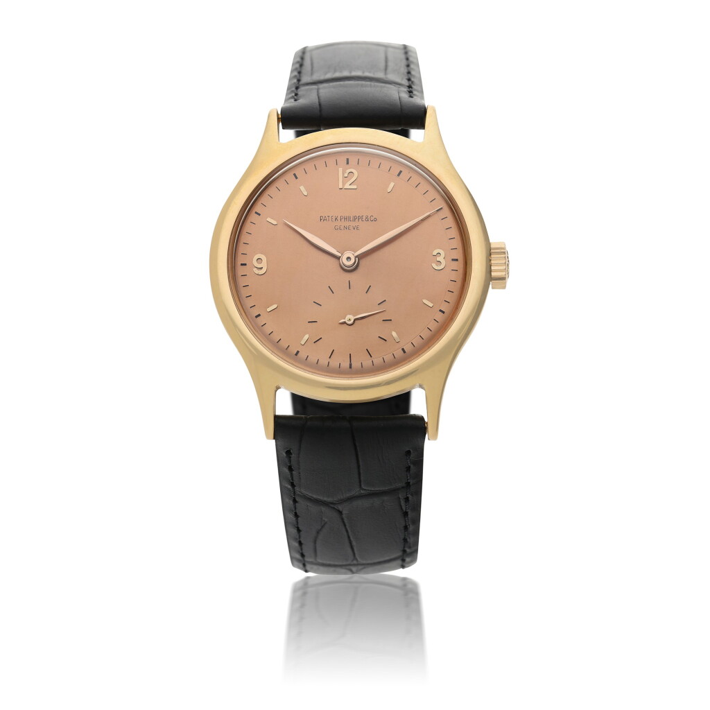 View full screen - View 1 of Lot 34. PATEK PHILIPPE | REFERENCE 565 A RARE PINK GOLD WRISTWATCH, MADE IN 1947.