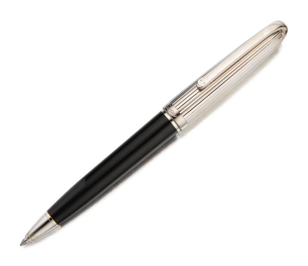 View full screen - View 1 of Lot 49. CARTIER | A PLATINUM PLATED AND BLACK LACQUER BALLPOINT PEN, CIRCA 2005.