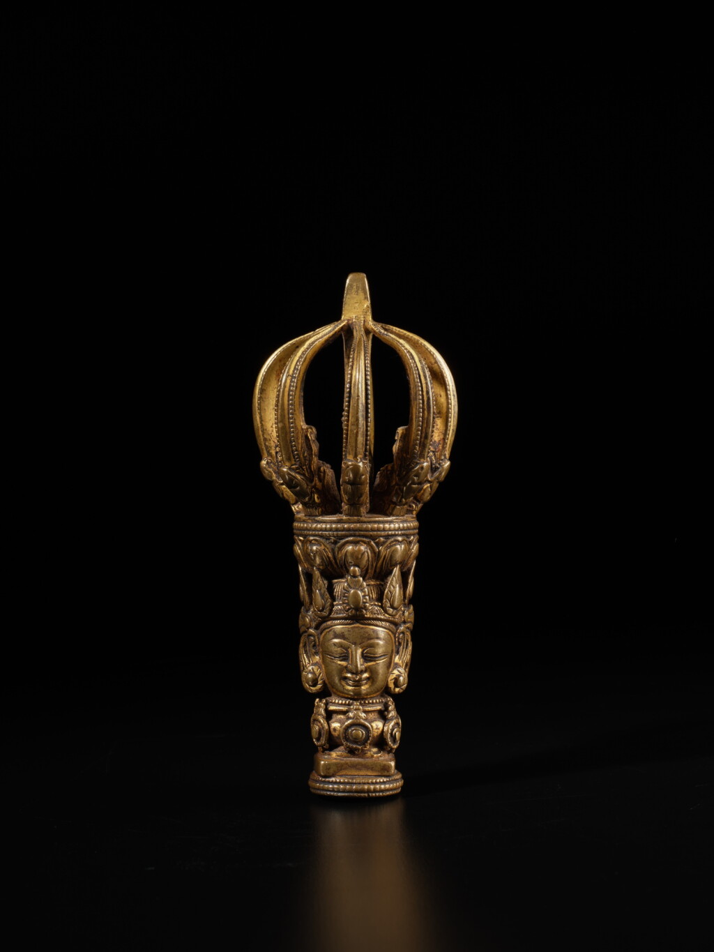View full screen - View 1 of Lot 180. A gilt-copper alloy bell handle, Ming dynasty, Yongle period .