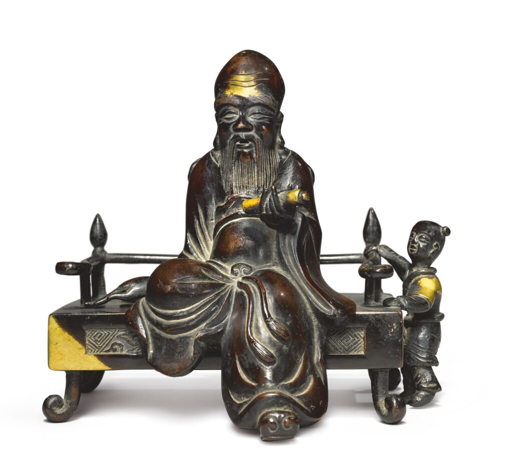 View full screen - View 1 of Lot 7. A CHINESE PARCEL-GILT BRONZE 'SHOULAO' GROUP 17TH/18TH CENTURY.