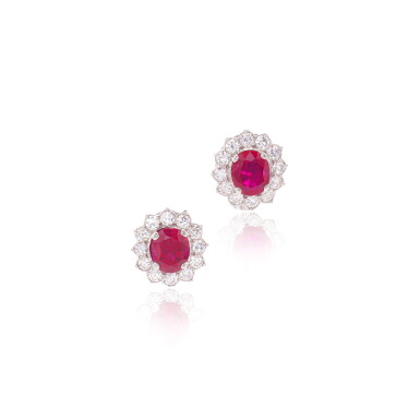 View full screen - View 1 of Lot 935. Pair of ruby and diamond ear clips.