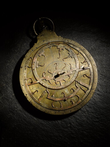 View full screen - View 1 of Lot 204. A large brass astrolabe, signed by Muhammad ibn Ahmad al-Battuti, Morocco, dated 1141 AH/1728-29 AD.