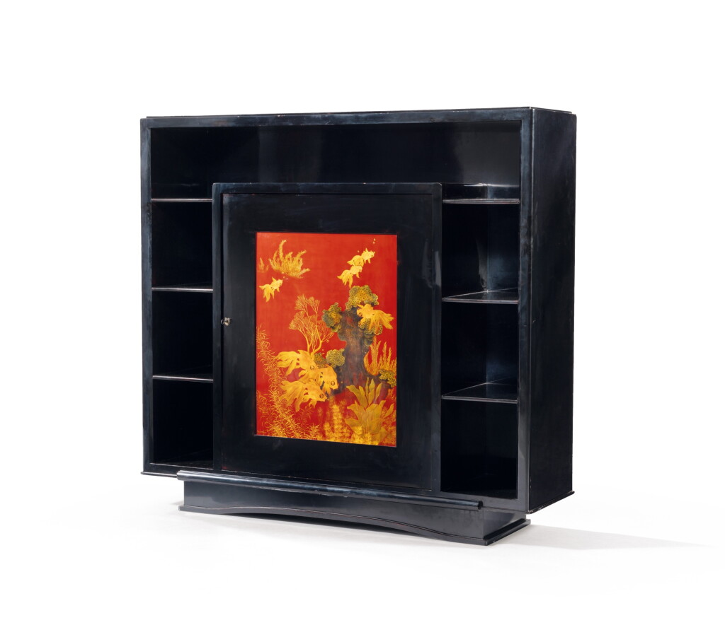 View full screen - View 1 of Lot 23. Truong Van Thanh studio (20th century), A large black lacquer bookcase | Truong Van Thanh 工作室 (二十世紀), 漆木金魚紋書櫃.