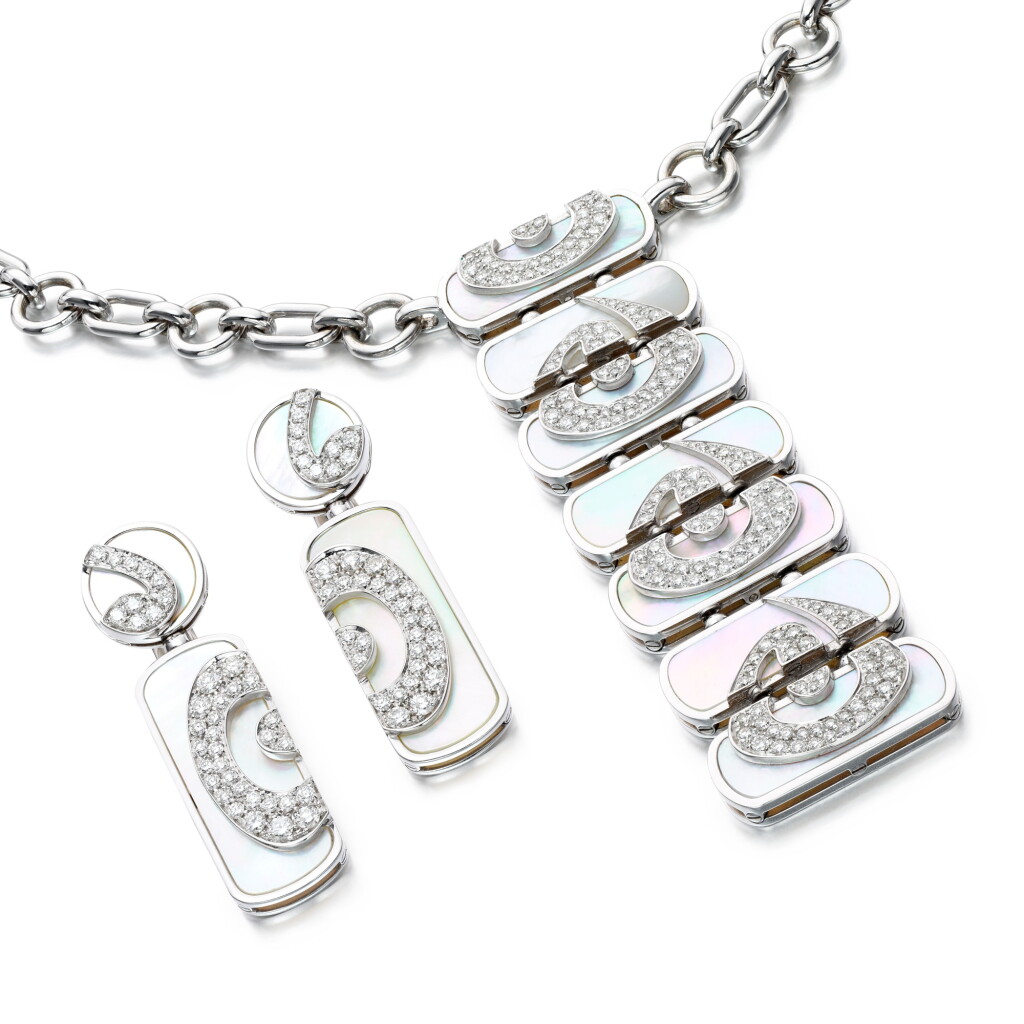 View full screen - View 1 of Lot 233. Diamond and mother of pearl demi-parure .