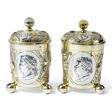 View full screen - View 1 of Lot 82. TWO MATCHING LARGE GERMAN PARCEL-GILT SILVER COVERED BEAKERS, JOHANN WAGNER, AUGSBURG, CIRCA 1700.