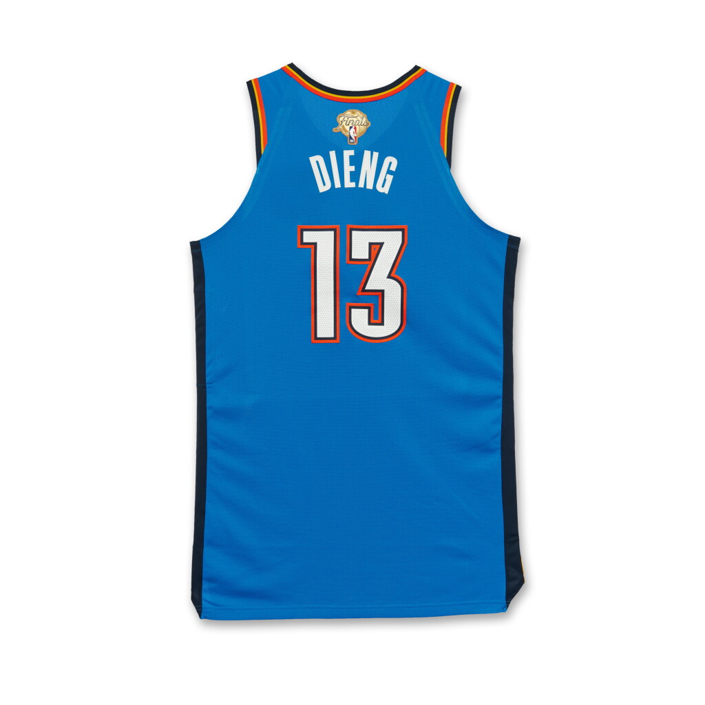 View full screen - View 1 of Lot 27. Ousmane Dieng Oklahoma City Thunder 2025 NBA Finals Game Issued Icon Edition Jersey | Game 3 | ‘Championship Run’ | Probable Wear | Matched to Locker Room Image .