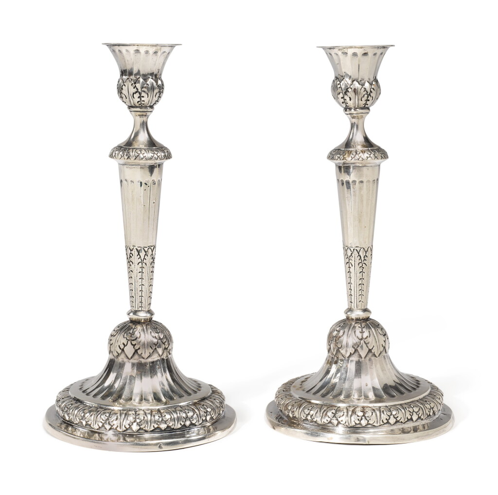 View full screen - View 1 of Lot 113. A PAIR OF ITALIAN SILVER CANDLESTICKS, GENOA, CIRCA 1830.