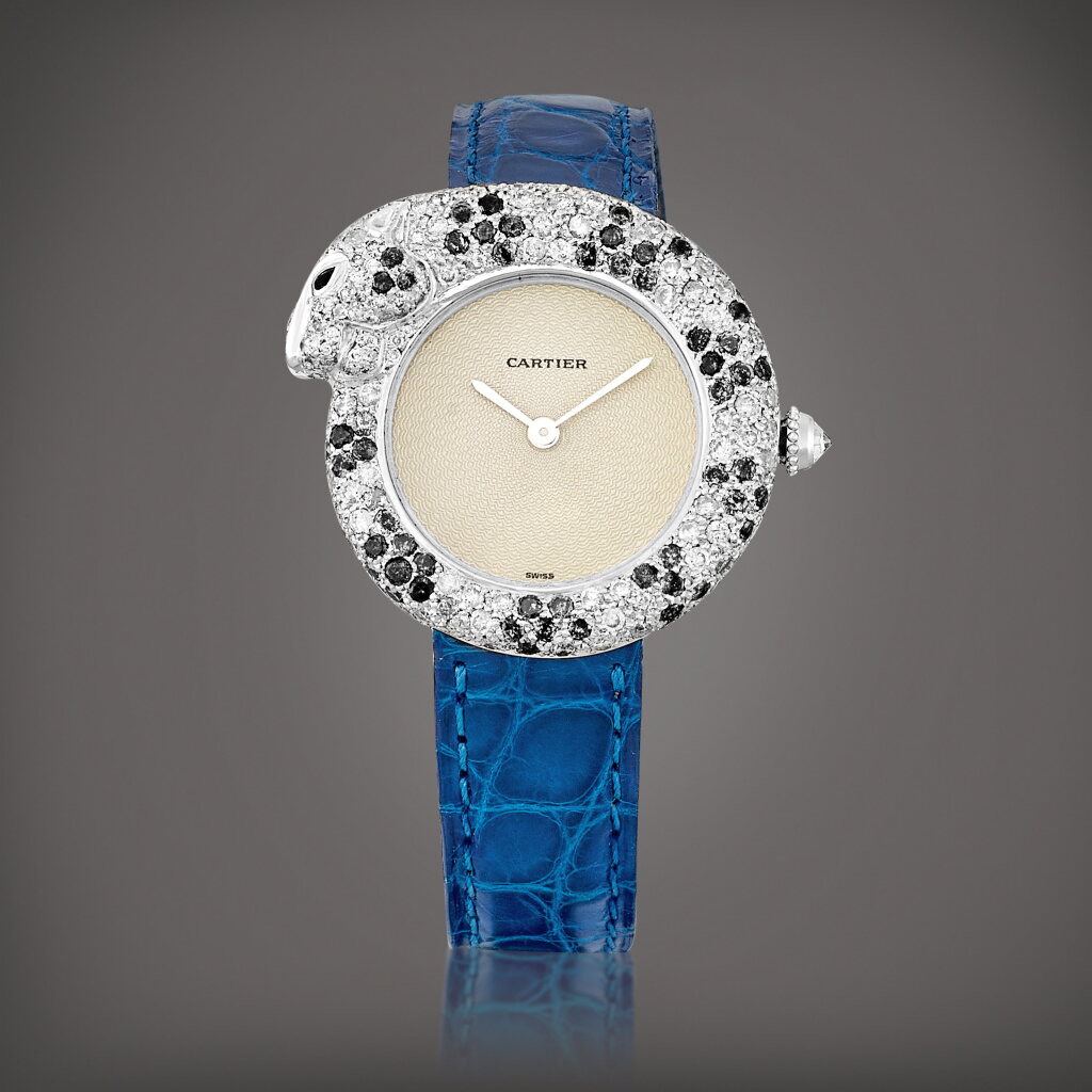 View full screen - View 1 of Lot 2119. Panthère, Reference 2323 | A white gold, diamond and onyx-set wristwatch, Circa 2001 | 卡地亞 | Panthère 型號2323 | 白金鑲鑽石及瑪瑙腕錶,約2001年製.