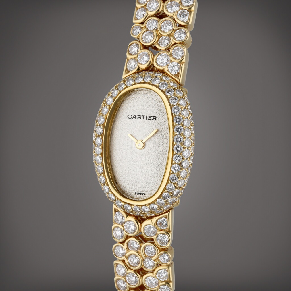View full screen - View 1 of Lot 80. Baignoire | A yellow gold and diamond-set wristwatch with bracelet, Circa 2005.