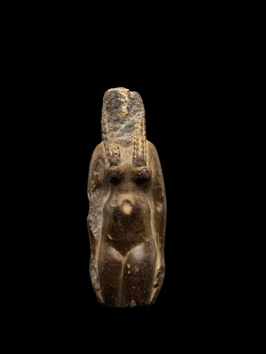 View full screen - View 1 of Lot 50. An Egyptian Fragmentary Brown Steatite Figure of Hathor, Ptolemaic Period, 305-30 B.C..