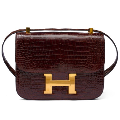 View full screen - View 1 of Lot 1391. Brown Shiny Crocodile Constance 24 Gold Hardware, 2002.