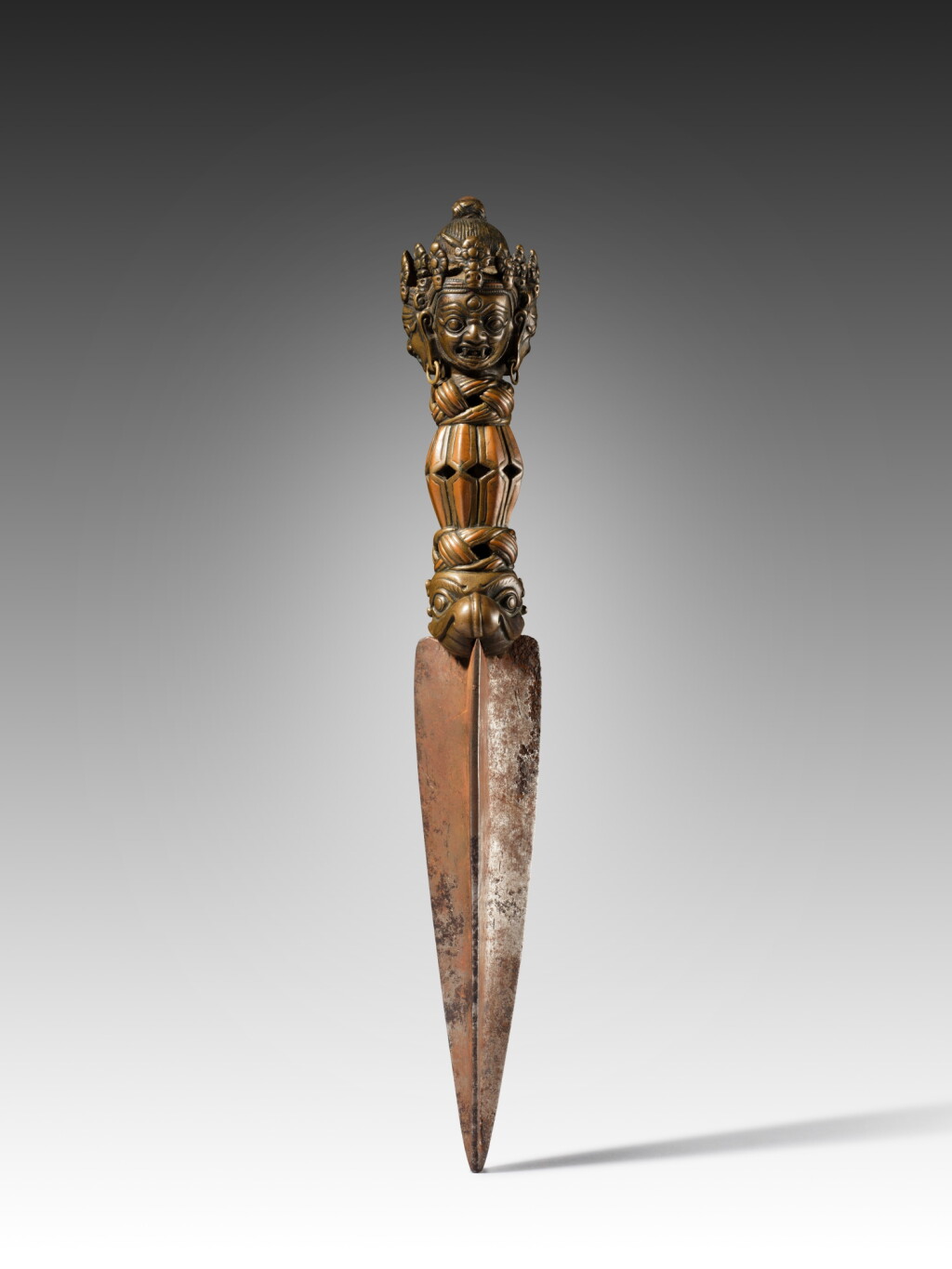 View full screen - View 1 of Lot 130. A copper-inlaid copper-alloy and iron ritual dagger, Tibet, 14th century.
