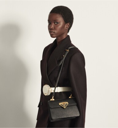 View full screen - View 1 of Lot 18. PRADA | SAFFIANO LEATHER SYMBOLE BAG. WORN BY ANOK YAI.