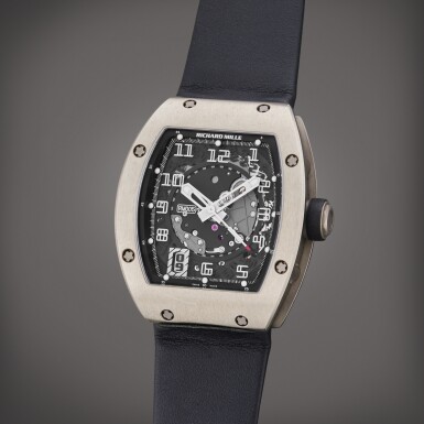 View full screen - View 1 of Lot 43. Reference RM005 AE Ti | A titanium tonneau shaped automatic wristwatch with date, Circa 2006.