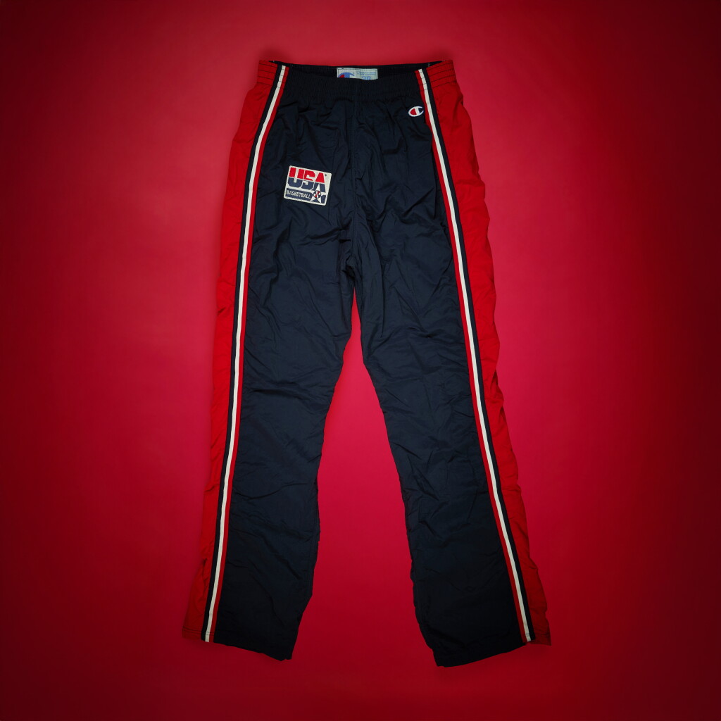 View full screen - View 1 of Lot 70. Scottie Pippen 1992 Olympics ‘Dream Team’ Warmup Pants | Set of 2 | Gold Medal Run.