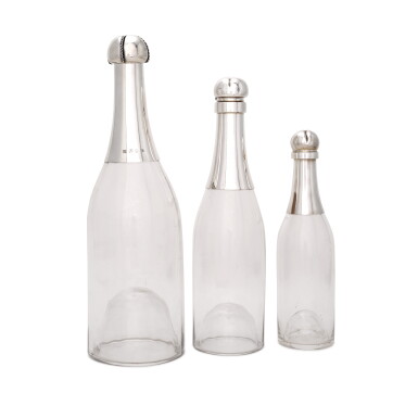 View full screen - View 1 of Lot 87. Three Victorian silver and glass novelty decanters, the smallest John Grinsell & Sons, London 1893; the two larger decanters Hukin & Heath (mark of Heath & Middleton), Birmingham 1893/1896.